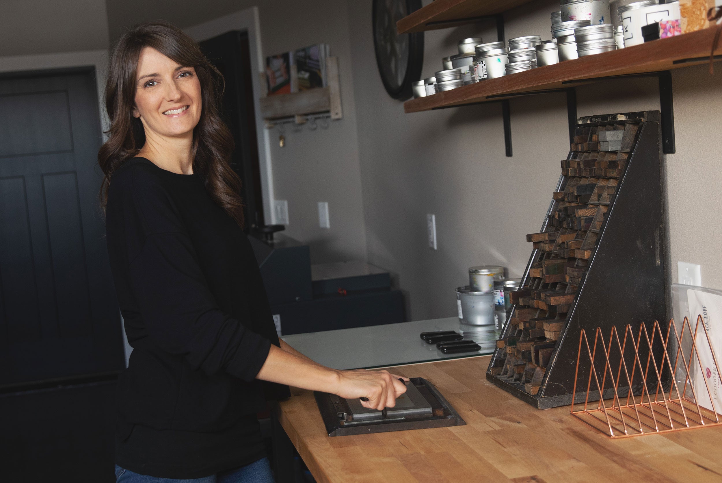Letterpress printer, Holly Kincaid, Bend, Oregon, working in studio