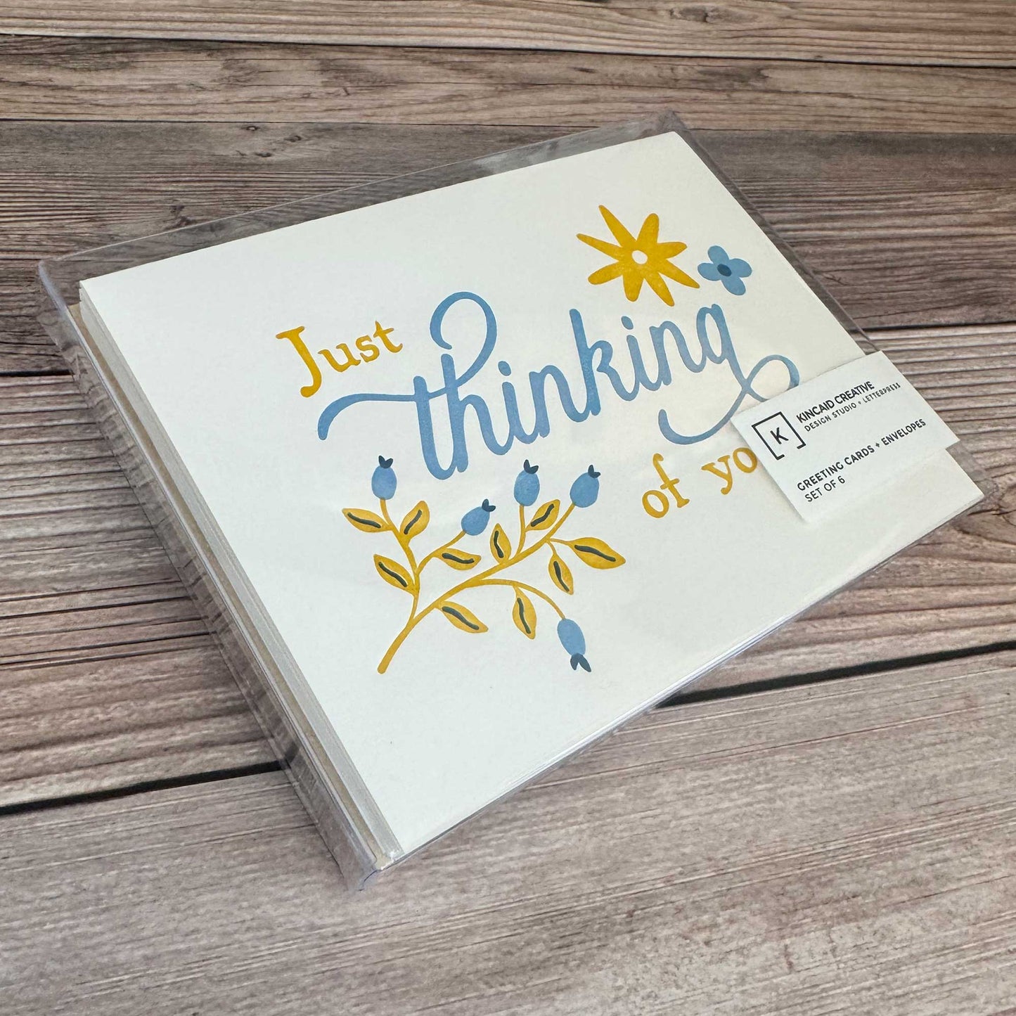 Box of 6 "Thinking of You" cards. Floral Design, blue and yellow, letterpress printed with Kraft Envelope. Whether you’re reaching out to offer emotional support, checking on a friend, or sending encouragement during a difficult time, this card is the perfect way to express your care. With a beautiful letterpress design, it’s ideal for those navigating a difficult situation, surgery recovery, or needing a thoughtful Get Well Soon or Sympathy Card. Boxed set of 6 shown.