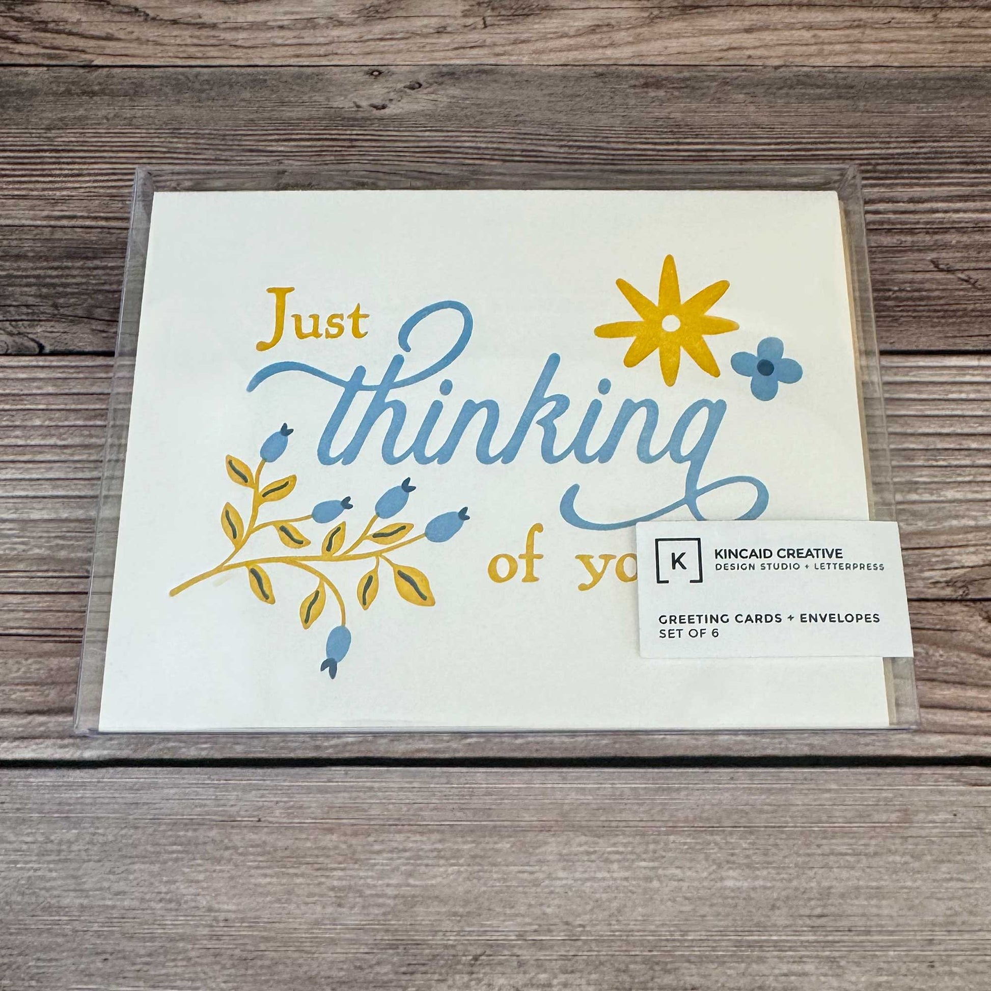 Box of 6 "Thinking of You" cards. Floral Design, blue and yellow, letterpress printed with Kraft Envelope. Whether you’re reaching out to offer emotional support, checking on a friend, or sending encouragement during a difficult time, this card is the perfect way to express your care. With a beautiful letterpress design, it’s ideal for those navigating a difficult situation, surgery recovery, or needing a thoughtful Get Well Soon or Sympathy Card. Boxed set of 6 shown.