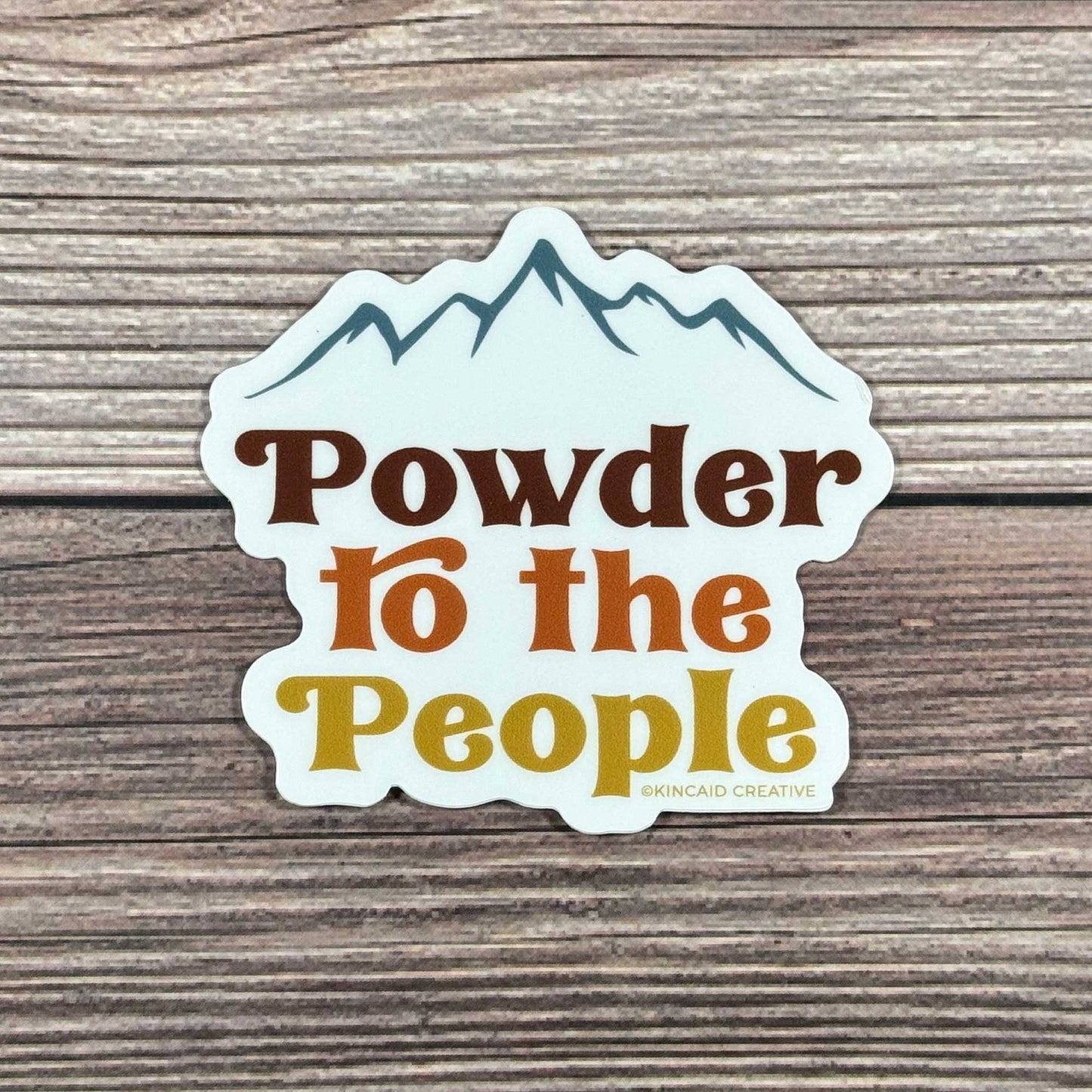 Show your love for the slopes with this Powder to the People vintage-style sticker. Perfect for skis, snowboards, helmets, water bottles, laptops, Kindles, or car bumpers. A great sticker set for snowboarders and skiers who love the mountains!