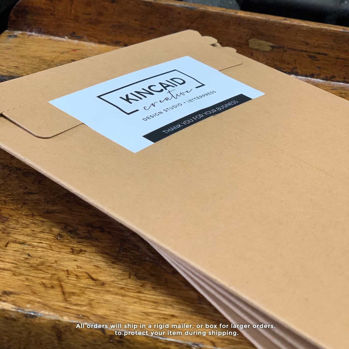Rigid shipping envelope to protect your greeting card order in the mail, Kincaid Creative brand labels