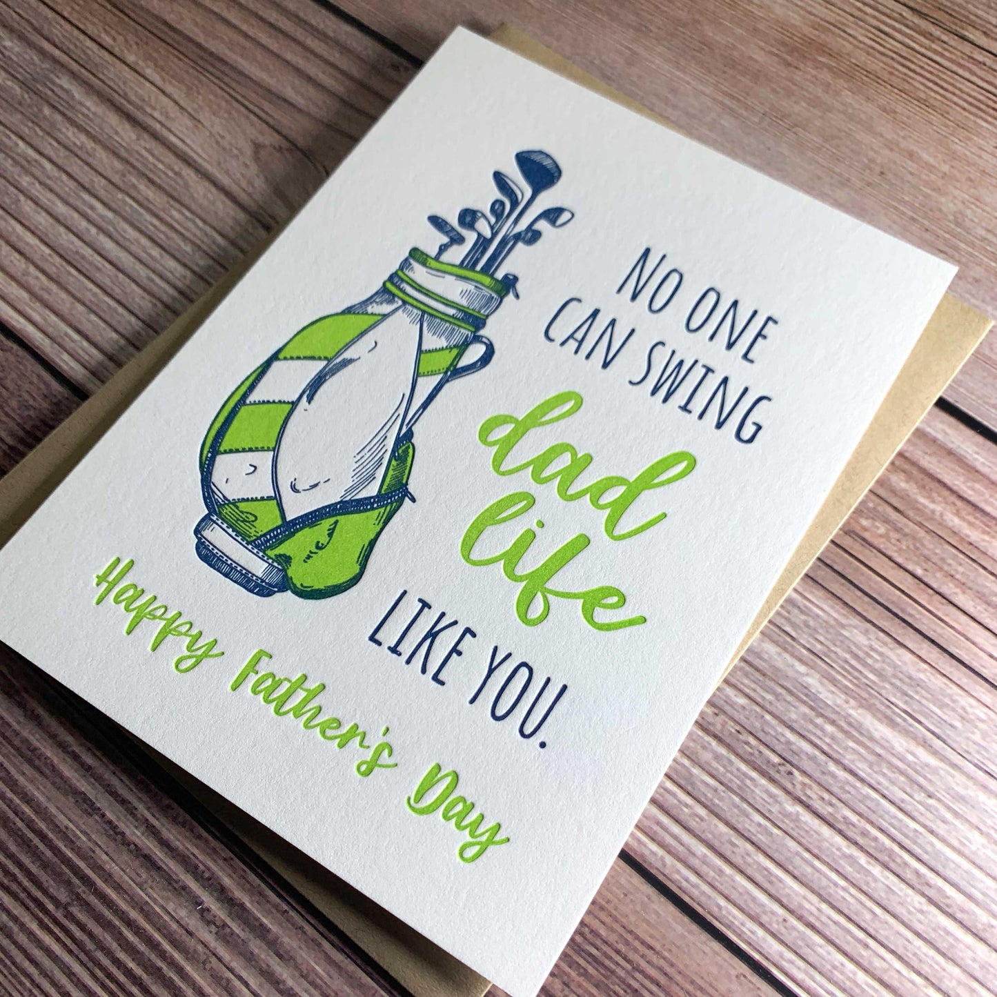 No one can swing dad life like you. Happy Father's Day, Card for golfing dads, bag of golf clubs, Letterpress printed, view shows letterpress impression, includes envelope