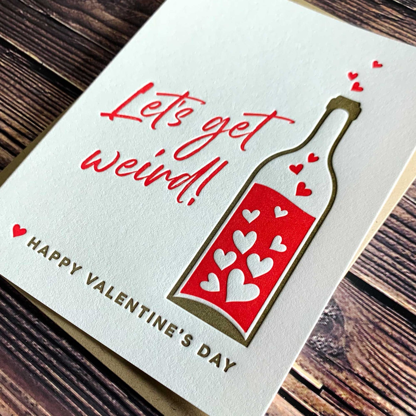 Let's get weird, Happy Valentine's Day, Funny Valentines card for him, wine bottle with heart bubbles, Letterpress printed, view shows letterpress impression, includes envelope